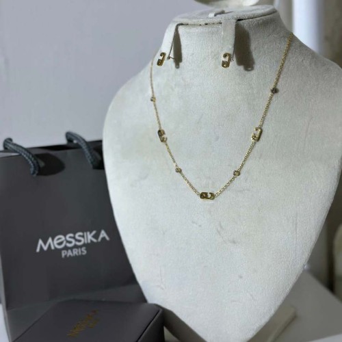 سلسال مع حلق ماركة ميسيكا لون ذهبي مع فصوص بدون ملحقات 